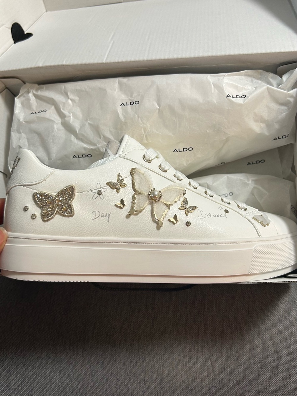 ALDO White Platform Sneakers with Gold Butterfly Embellishments